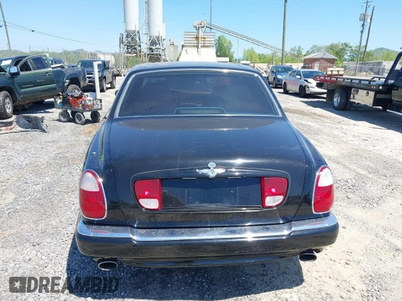 1999 Bentley Arnage z VIN SCBLB51E1XCX01401, wystawiony jako IAAI lot #42133144 z przebiegiem 29 699 mil mil oraz . Historia ofert i sprzedaży dostępna na DreamBid. Obrazek 16.