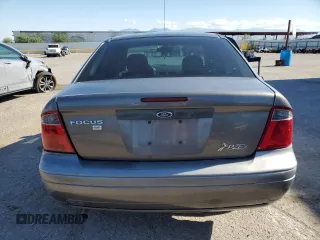 2007 Ford Focus S z VIN 1FAHP34N77W192231, wystawiony jako Copart lot #59020505 z przebiegiem 99 284 mil mil oraz Szkoda całkowita • Salvage title. Historia ofert i sprzedaży dostępna na DreamBid. Obrazek 6.