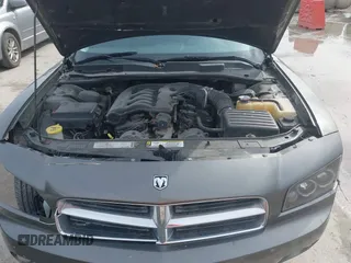 2010 Dodge Charger SXT with VIN 2B3CA3CV0AH234012, listed as a IAAI auction lot 41670267 with 202,182 mi miles and . Bid and sale history available at carsss.com. Image 10.