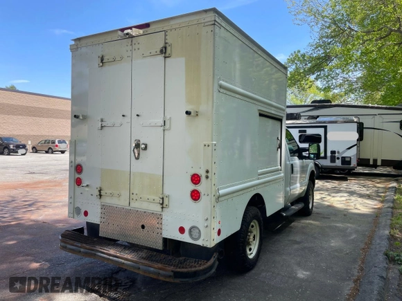 2015 Ford F-250 XL with VIN 1FDBF2B68FEA47594, listed as a Copart auction lot 64337445 with 451,093 mi miles and Clean title. Bid and sale history available at DreamBid. Image 4.
