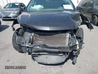 2017 Chevrolet Traverse LS z VIN 1GNKRFED1HJ154839, wystawiony jako IAAI lot #42304339 z przebiegiem Nie podano mil oraz . Historia ofert i sprzedaży dostępna na DreamBid. Obrazek 6.