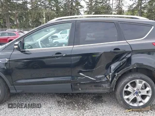 2014 Ford Escape Titanium with VIN 1FMCU9J95EUD60587, listed as a IAAI auction lot 42129854 with 155,559 mi miles and . Bid and sale history available at DreamBid. Image 14.