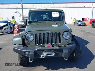 2015 Jeep Wrangler Rubicon Hard Rock with VIN 1C4BJWCGXFL771669, listed as a IAAI auction lot 42057423 with 36,996 mi miles and . Bid and sale history available at DreamBid. Image 13.