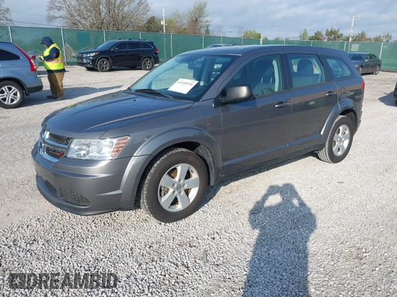 2013 Dodge Journey American Value with VIN 3C4PDCAB2DT501243, listed as a IAAI auction lot 41928930 with 147,437 mi miles and . Bid and sale history available at DreamBid. Image 2.