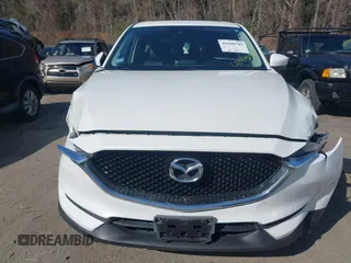2017 Mazda CX-5 Touring z VIN JM3KFBCL8H0214052, wystawiony jako IAAI lot #41940783 z przebiegiem 120 083 mil mil oraz . Historia ofert i sprzedaży dostępna na DreamBid. Obrazek 11.