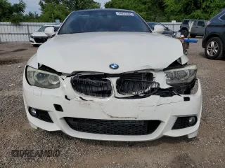 2011 BMW 3 Series 335i xDrive with VIN WBAKF9C5XBE620392, listed as a Copart auction lot 64293505 with 136,286 mi miles and Clean title. Bid and sale history available at DreamBid. Image 5.