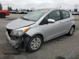 2012 Toyota Yaris L with VIN JTDKTUD38CD541872, listed as a Copart auction lot 55987215 with 103,724 mi miles and Salvage title. Bid and sale history available at DreamBid. Image 1.