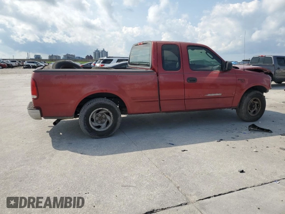 2004 Ford F-150 XL with VIN 2FTRX17W64CA79272, listed as a Copart auction lot 59186965 with 170,512 mi miles and Salvage title. Bid and sale history available at DreamBid. Image 3.