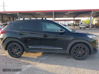 2017 Hyundai Tucson Value with VIN KM8J33A2XHU462806, listed as a IAAI auction lot 42045963 with 102,678 mi miles. Bid and sale history available at carsss.com. Image 13.