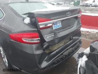 2017 Ford Fusion Energi SE with VIN 3FA6P0PU6HR203037, listed as a IAAI auction lot 41567334 with 96,852 mi miles. Bid and sale history available at carsss.com. Image 6.