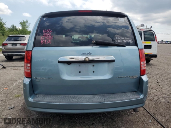 2009 Chrysler Town & Country Touring with VIN 2A8HR54X39R667914, listed as a Copart auction lot 66010904 with 214,583 mi miles and Salvage Title. Bid and sale history available at DreamBid. Image 6.