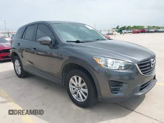 2016 Mazda CX-5 Sport z VIN JM3KE4BY8G0921243, wystawiony jako IAAI lot #42102663 z przebiegiem 111 960 mil mil oraz . Historia ofert i sprzedaży dostępna na DreamBid. Obrazek 1.