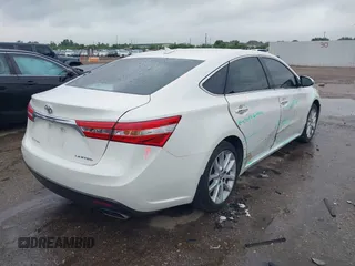 2013 Toyota Avalon XLE z VIN 4T1BK1EB5DU062247, wystawiony jako IAAI lot #42194529 z przebiegiem 189 092 mil mil oraz . Historia ofert i sprzedaży dostępna na DreamBid. Obrazek 4.