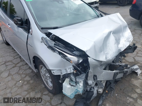 2018 Toyota Prius Two with VIN JTDKARFU0J3056217, listed as a IAAI auction lot 42185122 with 52,344 mi miles and . Bid and sale history available at DreamBid. Image 6.