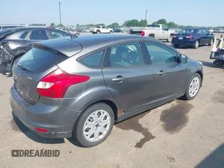 2012 Ford Focus SE z VIN 1FAHP3K21CL347716, wystawiony jako IAAI lot #42415555 z przebiegiem 182 693 mil mil oraz . Historia ofert i sprzedaży dostępna na DreamBid. Obrazek 4.