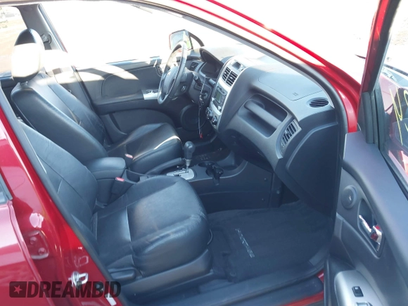 2009 Kia Sportage LX with VIN KNDJE723997634014, listed as a IAAI auction lot 41452224 with 148,643 mi miles. Bid and sale history available at carsss.com. Image 5.