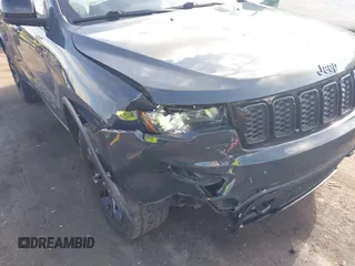 2018 Jeep Grand Cherokee Altitude with VIN 1C4RJFAG7JC394051, listed as a IAAI auction lot 42492771 with 147,669 mi miles and . Bid and sale history available at DreamBid. Image 6.