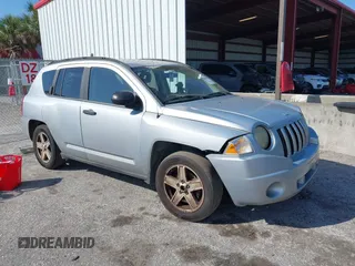 2007 Jeep Compass Sport with VIN 1J8FT47W57D185807, listed as a IAAI auction lot 41700283 with 194,339 mi miles. Bid and sale history available at carsss.com. Image 1.