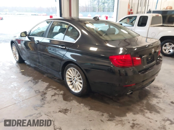 2013 BMW 5 Series 535i xDrive with VIN WBAFU7C54DDU71868, listed as a IAAI auction lot 41857848 with 111,944 mi miles and . Bid and sale history available at carsss.com. Image 3.