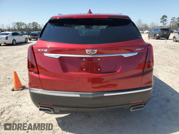 2023 Cadillac XT5 FWD Luxury z VIN 1GYKNAR45PZ191436, wystawiony jako Copart lot #45653615 z przebiegiem 15 044 mil mil oraz Szkoda całkowita • Salvage title. Historia ofert i sprzedaży dostępna na DreamBid. Obrazek 6.