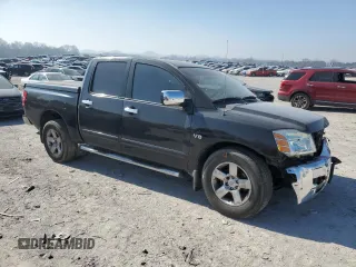 2004 Nissan Titan SE with VIN 1N6AA07A44N550324, listed as a Copart auction lot 48570595 with 206,330 mi miles and Salvage title. Bid and sale history available at DreamBid. Image 4.