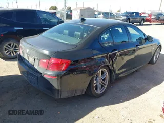 2016 BMW 5 Series 528i xDrive with VIN WBA5A7C56GG145318, listed as a IAAI auction lot 41414556 with 122,879 mi miles. Bid and sale history available at carsss.com. Image 4.