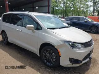 2020 Chrysler Pacifica Launch Edition z VIN 2C4RC3BG6LR288952, wystawiony jako IAAI lot #42122770 z przebiegiem 32 942 mil mil oraz . Historia ofert i sprzedaży dostępna na DreamBid. Obrazek 1.