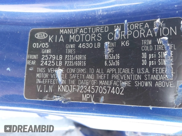 2005 Kia Sportage LX with VIN KNDJF723457057402, listed as a IAAI auction lot 41471742 with 215,565 mi miles and . Bid and sale history available at carsss.com. Image 9.