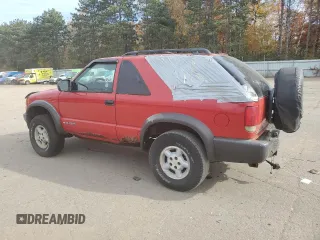 2000 Chevrolet Blazer LS z VIN 1GNCT18W8YK155812, wystawiony jako Copart lot #77315424 z przebiegiem 151 418 mil mil oraz Czysty tytuł • Clean title. Historia ofert i sprzedaży dostępna na DreamBid. Obrazek 2.