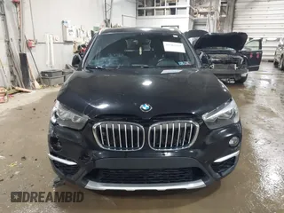 2018 BMW X1 xDrive28i with VIN WBXHT3C30J5K29383, listed as a IAAI auction lot 41503314 with 107,678 mi miles. Bid and sale history available at carsss.com. Image 12.