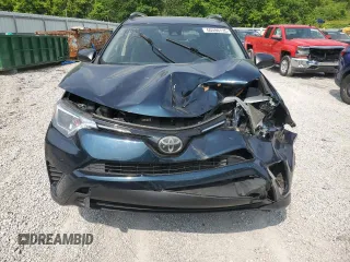 2018 Toyota RAV4 LE with VIN JTMBFREV7JJ253067, listed as a Copart auction lot 60596735 with Not provided miles and Salvage title. Bid and sale history available at DreamBid. Image 5.