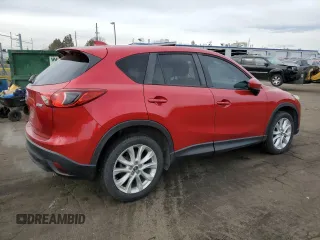 2014 Mazda CX-5 Grand Touring with VIN JM3KE4DY5E0360896, listed as a Copart auction lot 43978975 with 113,942 mi miles and Salvage Title. Bid and sale history available at carsss.com. Image 3.