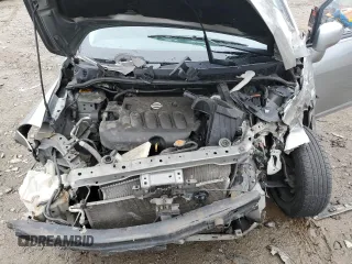 2010 Nissan Versa S z VIN 3N1BC1AP9AL418100, wystawiony jako Copart lot #57971985 z przebiegiem 95 353 mil mil oraz Szkoda całkowita • Salvage title. Historia ofert i sprzedaży dostępna na DreamBid. Obrazek 11.