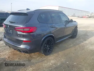 2020 BMW X5 sDrive40i with VIN 5UXCR4C06LLW64438, listed as a IAAI auction lot 41520407 with 89,868 mi miles and . Bid and sale history available at DreamBid. Image 4.