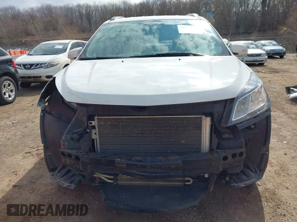 2017 Chevrolet Traverse LT with VIN 1GNKRGKD1HJ261691, listed as a IAAI auction lot 41897518 with 181,753 mi miles and . Bid and sale history available at DreamBid. Image 12.