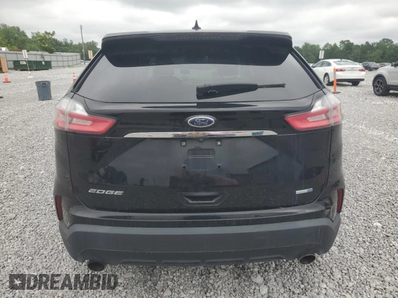 2019 Ford Edge SE z VIN 2FMPK4G94KBB17727, wystawiony jako Copart lot #61060665 z przebiegiem 137 187 mil mil oraz Czysty tytuł • Clean title. Historia ofert i sprzedaży dostępna na DreamBid. Obrazek 6.