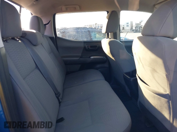 2018 Toyota Tacoma SR with VIN 3TMCZ5AN3JM138480, listed as a IAAI auction lot 41080910 with 99,225 mi miles. Bid and sale history available at carsss.com. Image 8.