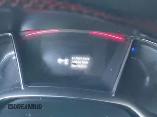 2019 Honda Civic Si z VIN 2HGFC1E55KH701354, wystawiony jako IAAI lot #42115508 z przebiegiem Nie podano mil oraz . Historia ofert i sprzedaży dostępna na DreamBid. Obrazek 14.