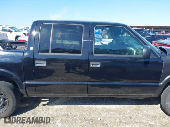 2004 GMC Sonoma SLS with VIN 1GTDT13X74K107743, listed as a IAAI auction lot 41767517 with 254,323 mi miles. Bid and sale history available at carsss.com. Image 14.