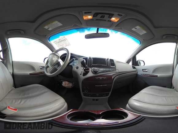 2014 Toyota Sienna XLE with VIN 5TDYK3DC7ES517206, listed as a IAAI auction lot 41945572 with 128,743 mi miles and . Bid and sale history available at DreamBid. Image 19.