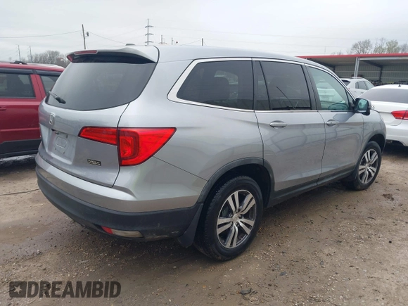 2018 Honda Pilot EX-L with VIN 5FNYF5H54JB006773, listed as a IAAI auction lot 41534534 with 131,570 mi miles. Bid and sale history available at carsss.com. Image 4.
