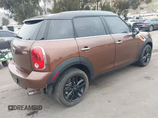 2013 MINI Countryman with VIN WMWZB3C56DWM09484, listed as a IAAI auction lot 42039954 with 37,264 mi miles and . Bid and sale history available at DreamBid. Image 4.