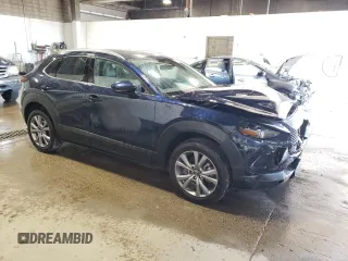 2024 Mazda CX-30 S Premium with VIN 3MVDMBDM7RM697044, listed as a Copart auction lot 55895525 with 17,145 mi miles and Salvage title. Bid and sale history available at DreamBid. Image 4.