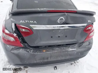 2018 Nissan Altima 2.5 SV with VIN 1N4AL3AP0JC136949, listed as a IAAI auction lot 41572923 with 69,000 mi miles. Bid and sale history available at carsss.com. Image 6.