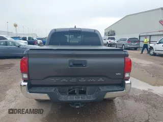 2018 Toyota Tacoma SR5 with VIN 5TFAZ5CN5JX062498, listed as a IAAI auction lot 41867393 with 128,879 mi miles and . Bid and sale history available at DreamBid. Image 17.