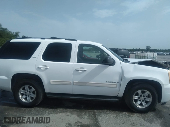 2009 GMC Yukon SLT w/4SB with VIN 1GKFC33049R272997, listed as a IAAI auction lot 39935360 with 290,952 mi miles. Bid and sale history available at carsss.com. Image 13.