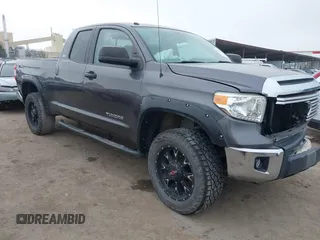 2014 Toyota Tundra SR z VIN 5TFUM5F16EX052444, wystawiony jako IAAI lot #42298372 z przebiegiem 121 876 mil mil oraz . Historia ofert i sprzedaży dostępna na DreamBid. Obrazek 1.