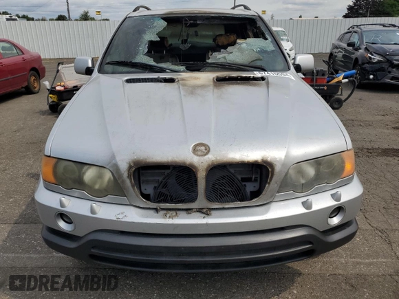 2001 BMW X5 4.4i with VIN WBAFB33581LH21745, listed as a Copart auction lot 67415594 with 0 mi miles and Salvage Title. Bid and sale history available at carsss.com. Image 5.