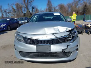 2016 Kia Optima LX with VIN 5XXGT4L37GG084538, listed as a IAAI auction lot 41784807 with 128,928 mi miles. Bid and sale history available at carsss.com. Image 12.