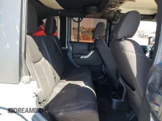 2015 Jeep Wrangler Unlimited Sahara with VIN 1C4BJWEGXFL624846, listed as a Copart auction lot 47949535 with 125,710 mi miles and Salvage Title. Bid and sale history available at carsss.com. Image 11.